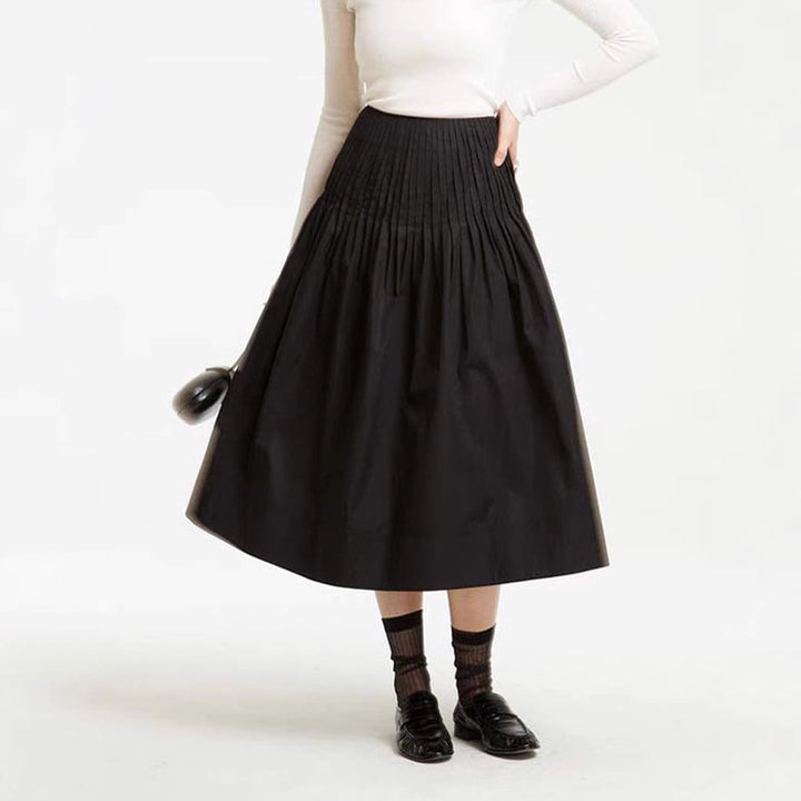 Kvinnors eleganta midi kjol med plisserade detaljer Mirla-Eva Jonsson