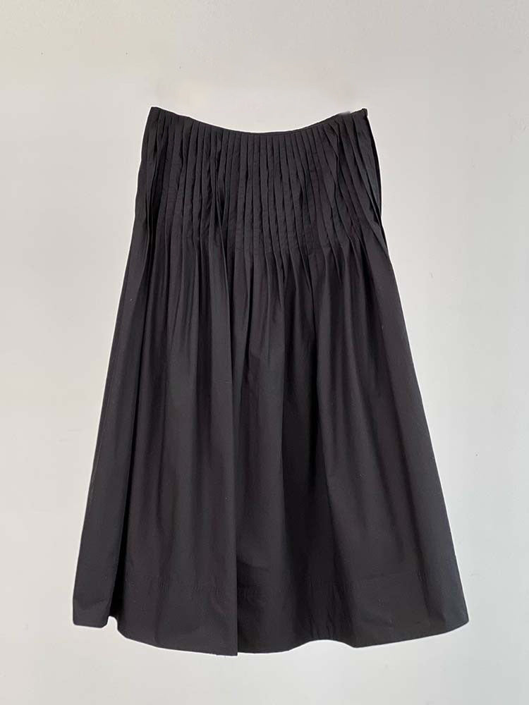 Kvinnors eleganta midi kjol med plisserade detaljer Mirla-Eva Jonsson