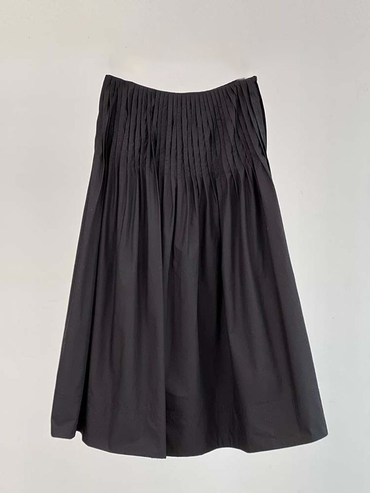 Kvinnors eleganta midi kjol med plisserade detaljer Mirla-Eva Jonsson