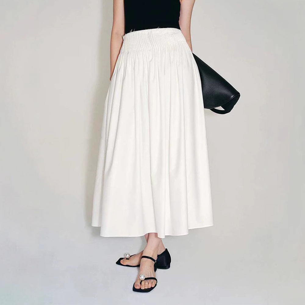 Kvinnors eleganta midi kjol med plisserade detaljer Mirla-Eva Jonsson