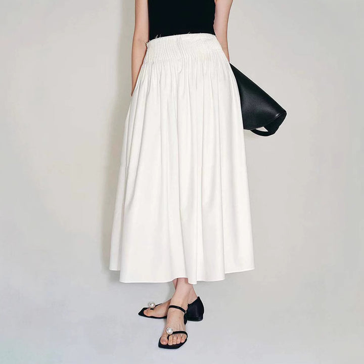 Kvinnors eleganta midi kjol med plisserade detaljer Mirla-Eva Jonsson