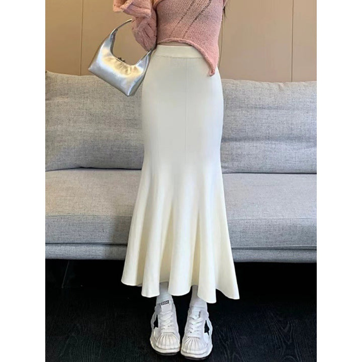Kvinnors eleganta midi kjol med svängande fåll och hög midja Mirla-Eva Jonsson