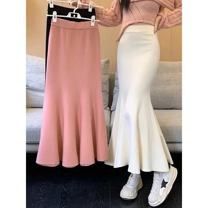Kvinnors eleganta midi kjol med svängande fåll och hög midja Mirla-Eva Jonsson