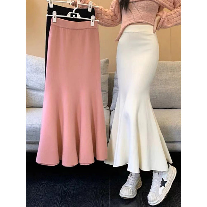Kvinnors eleganta midi kjol med svängande fåll och hög midja Mirla-Eva Jonsson