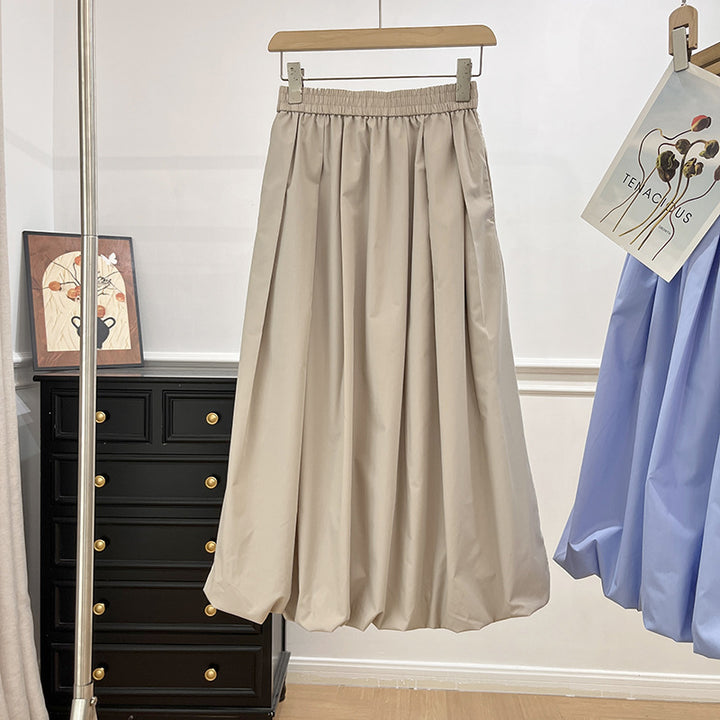 Kvinnors eleganta midikjol med elastisk midja och voluminös skärning Mirla-Eva Jonsson
