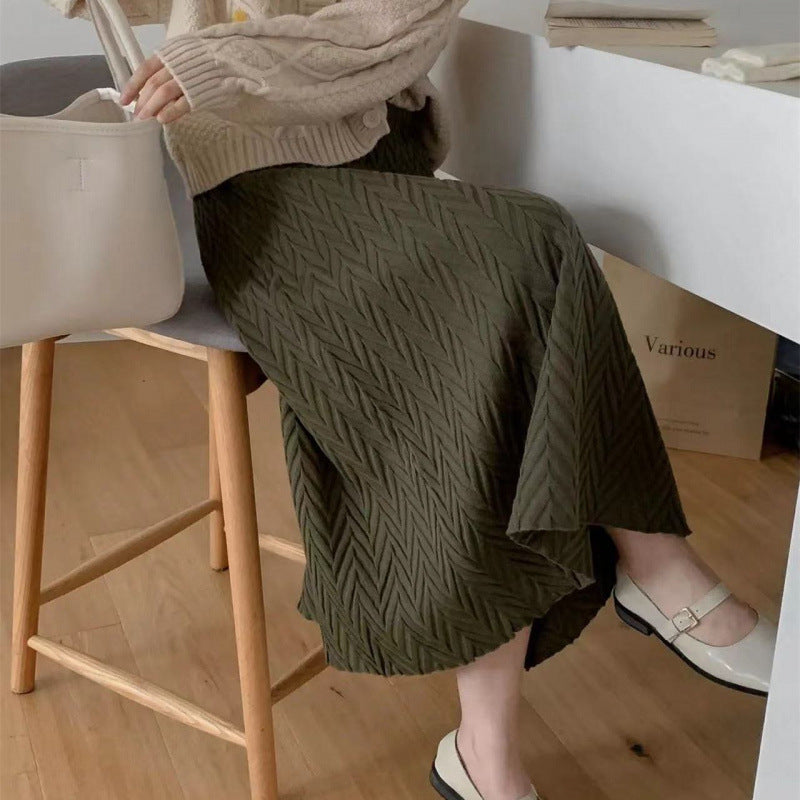 Kvinnors eleganta midikjol med texturerat chevronmönster Mirla-Eva Jonsson