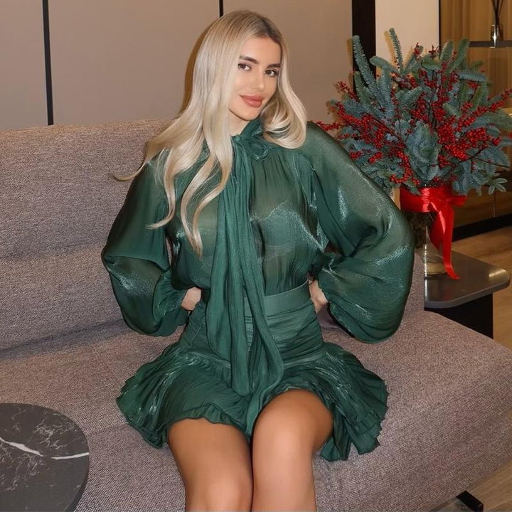 Kvinnors eleganta miniklänning med rosettkrage Mirla-Eva Jonsson