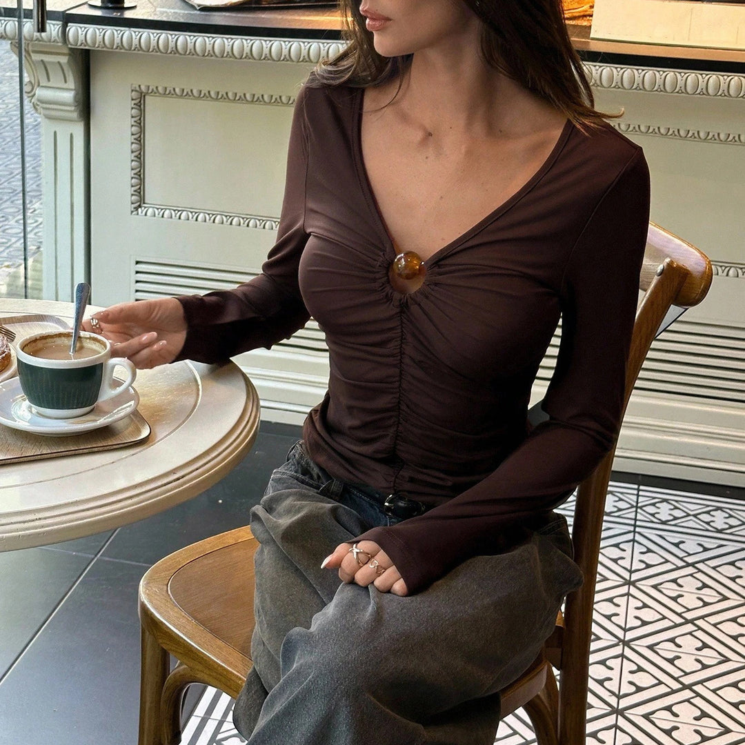 Kvinnors eleganta och figurnära långärmad topp Mirla-Eva Jonsson