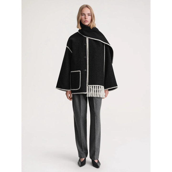 Kvinnors eleganta och mångsidiga ullponcho Mirla-Eva Jonsson