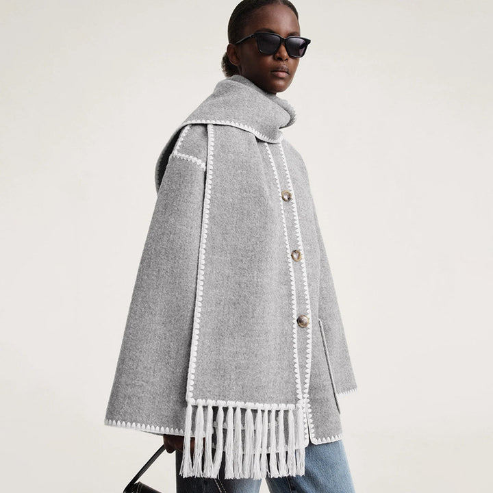 Kvinnors eleganta och mångsidiga ullponcho Mirla-Eva Jonsson