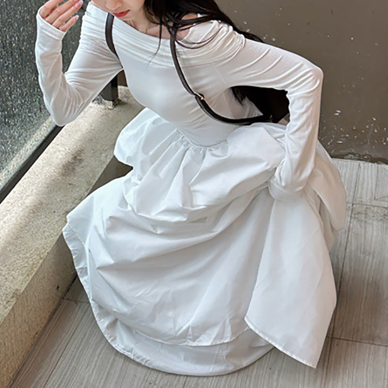 Kvinnors eleganta off-shoulder maxiklänning med moderna remdetaljer Mirla-Eva Jonsson