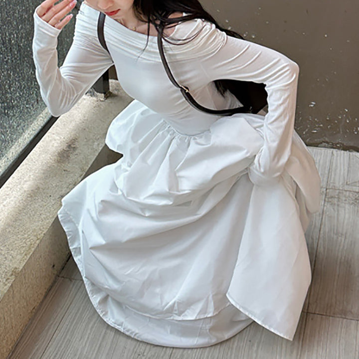 Kvinnors eleganta off-shoulder maxiklänning med moderna remdetaljer Mirla-Eva Jonsson