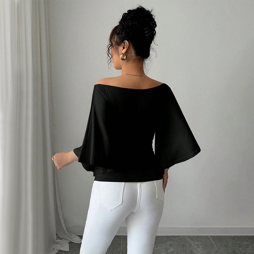 Kvinnors eleganta off-shoulder topp med breda ärmar och figurnära passform Mirla-Eva Jonsson