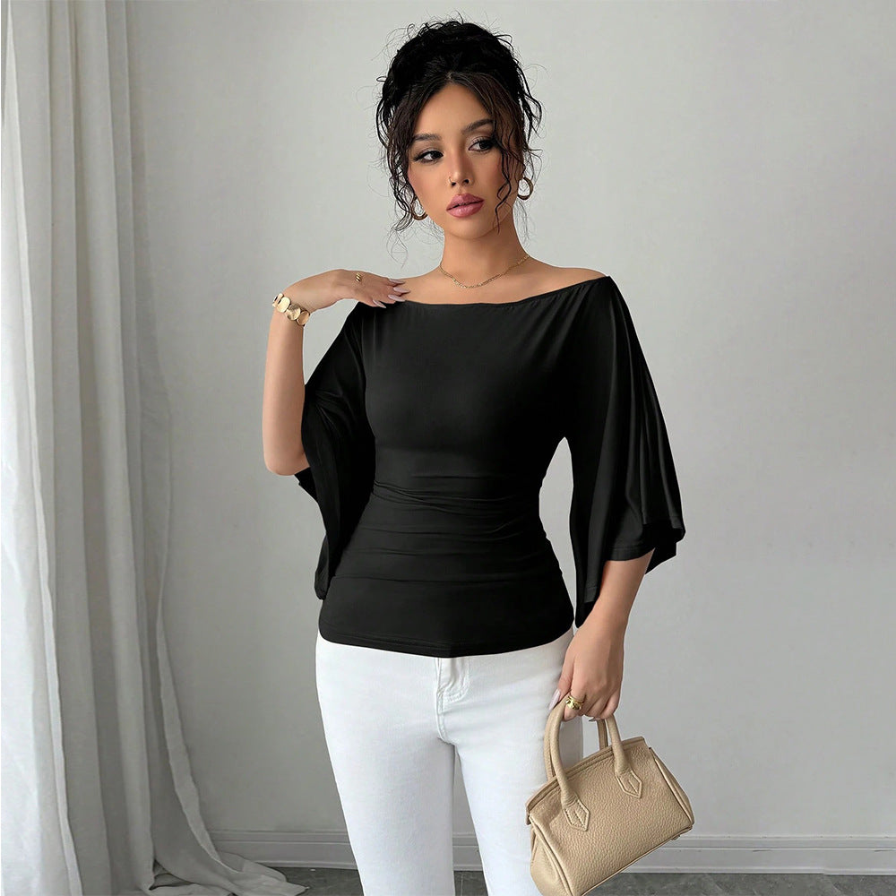 Kvinnors eleganta off-shoulder topp med breda ärmar och figurnära passform Mirla-Eva Jonsson