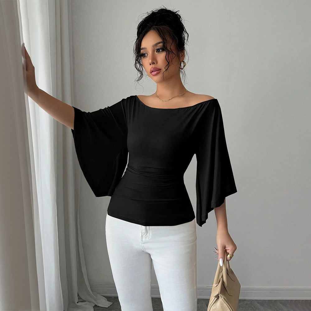 Kvinnors eleganta off-shoulder topp med breda ärmar och figurnära passform Mirla-Eva Jonsson