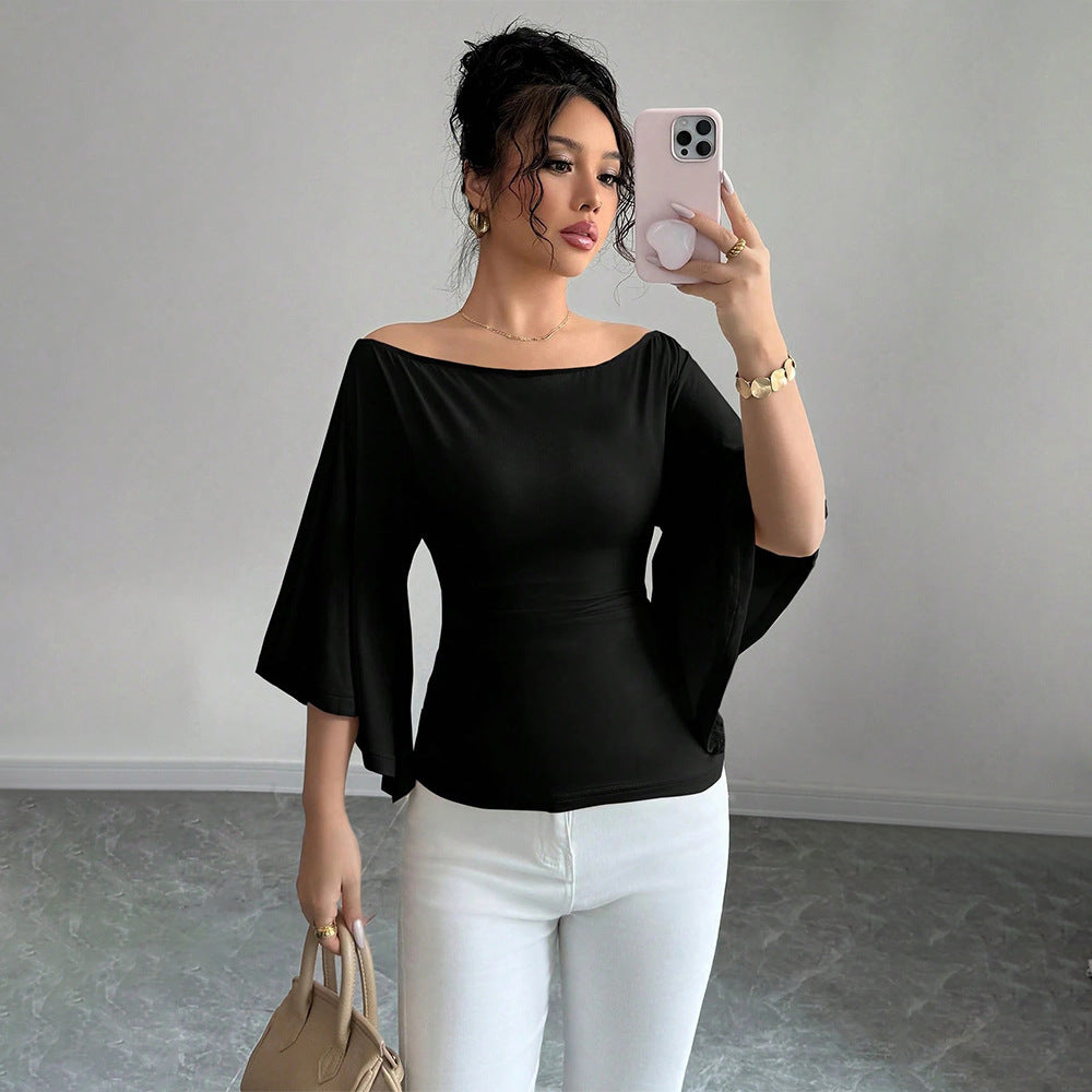 Kvinnors eleganta off-shoulder topp med breda ärmar och figurnära passform Mirla-Eva Jonsson