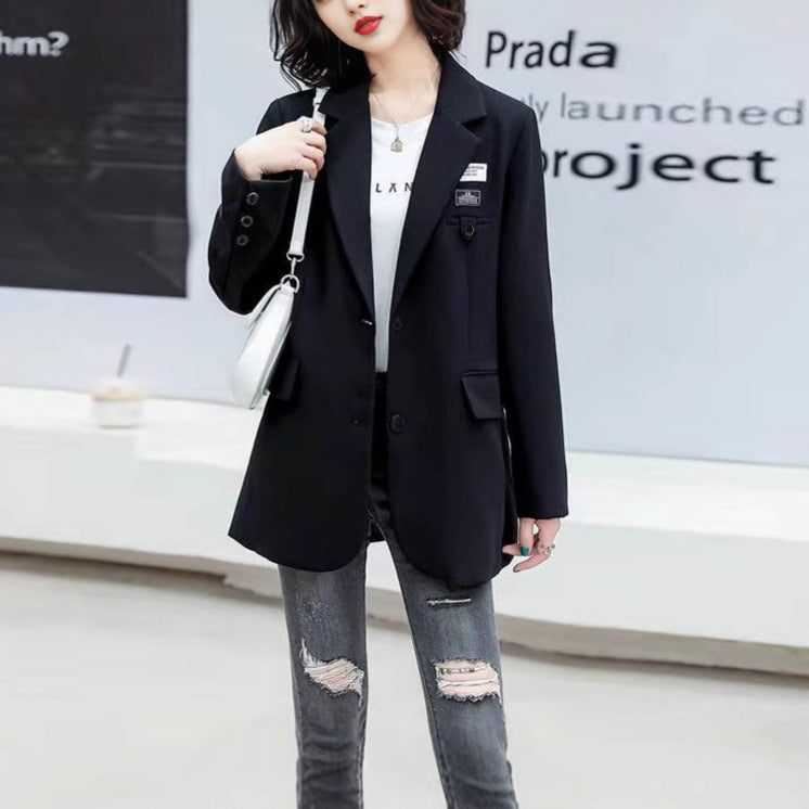 Kvinnors eleganta oversized blazer med dubbelknäppt skärning och moderna detaljer Mirla-Eva Jonsson