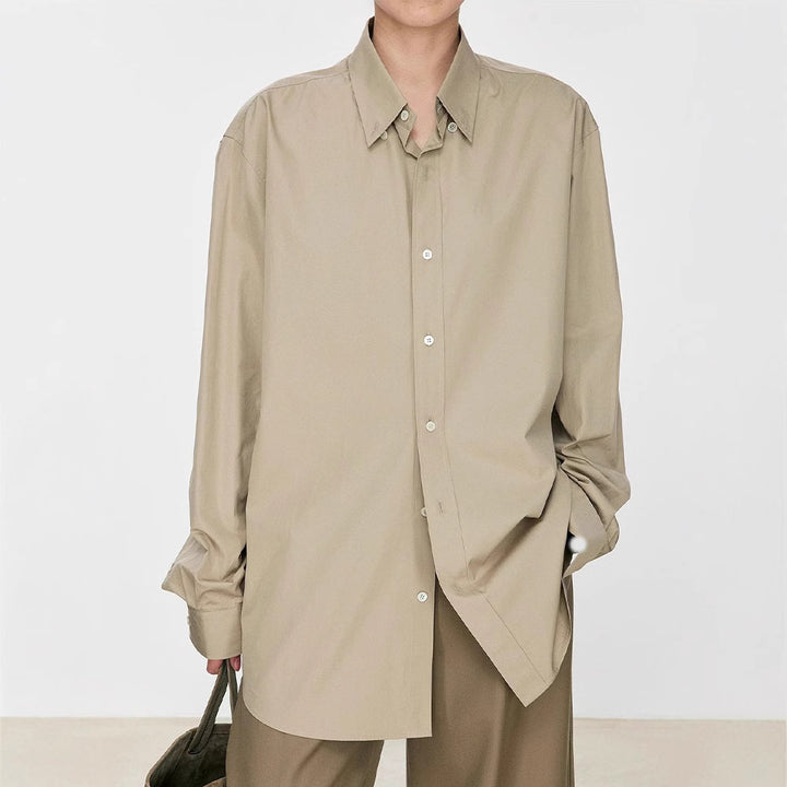 Kvinnors eleganta oversized blus med klassiska knapprad detaljer Mirla-Eva Jonsson