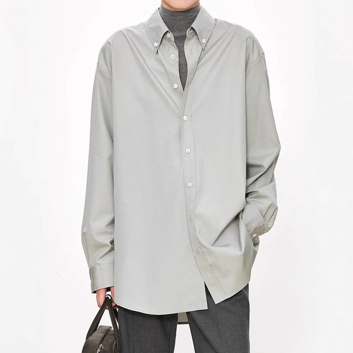 Kvinnors eleganta oversized blus med klassiska knapprad detaljer Mirla-Eva Jonsson