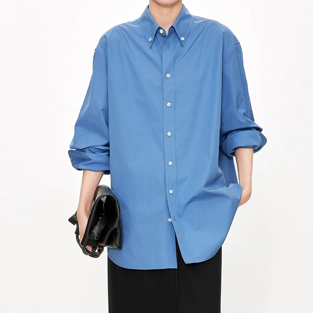 Kvinnors eleganta oversized blus med klassiska knapprad detaljer Mirla-Eva Jonsson