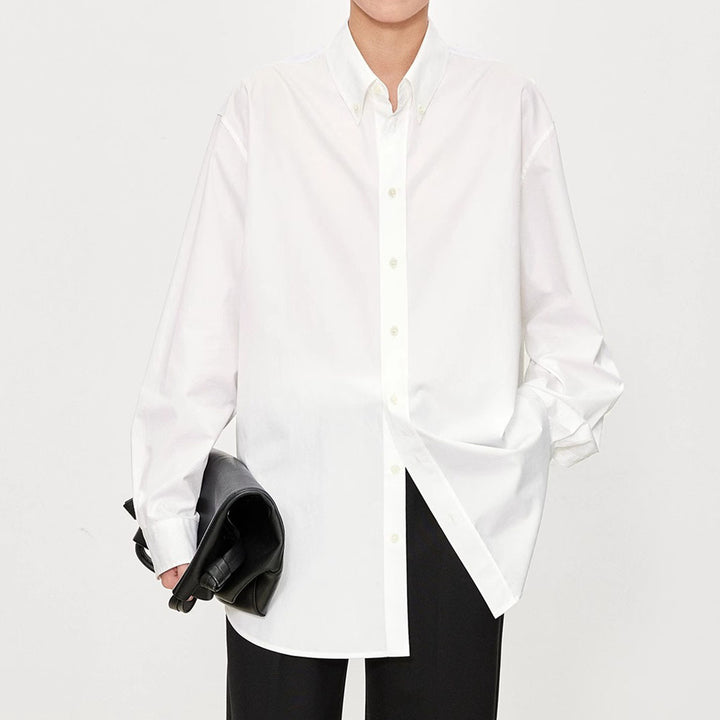 Kvinnors eleganta oversized blus med klassiska knapprad detaljer Mirla-Eva Jonsson