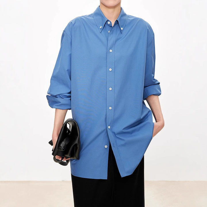 Kvinnors eleganta oversized blus med klassiska knapprad detaljer Mirla-Eva Jonsson