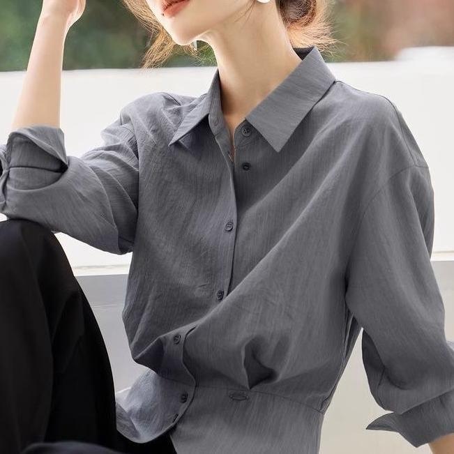 Kvinnors eleganta oversized blus med midjebälte Mirla-Eva Jonsson