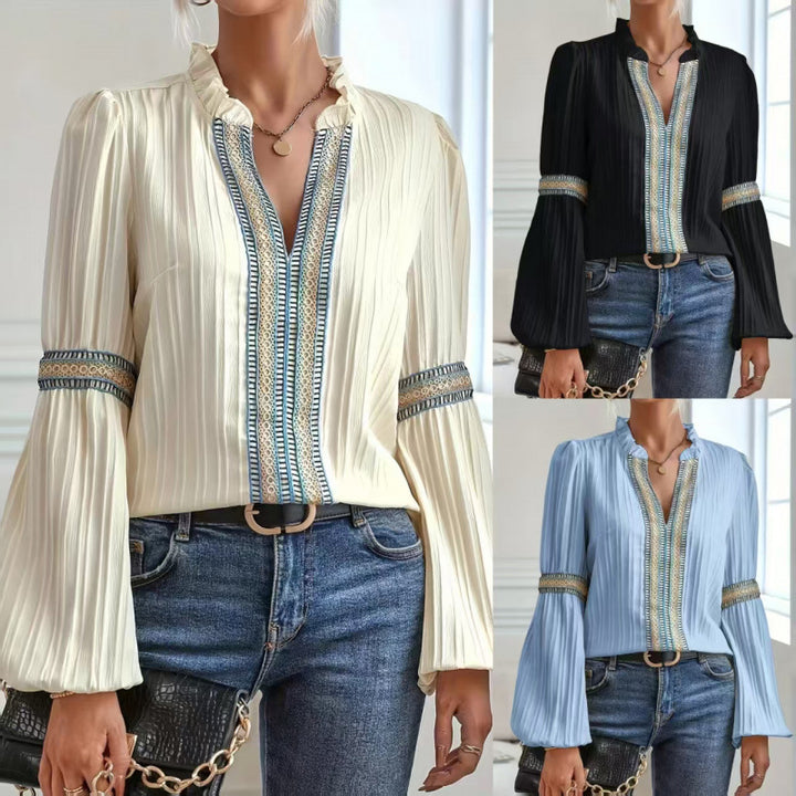Kvinnors eleganta plisserade blus med volangdetaljer Mirla-Eva Jonsson