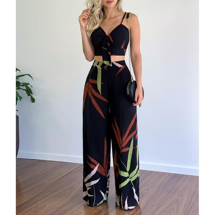 Kvinnors eleganta set med kombination av crop top och vida byxor Mirla-Eva Jonsson