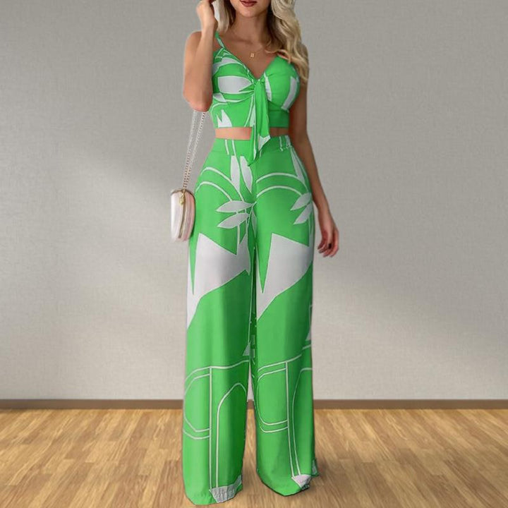Kvinnors eleganta set med kombination av crop top och vida byxor Mirla-Eva Jonsson