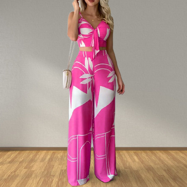 Kvinnors eleganta set med kombination av crop top och vida byxor Mirla-Eva Jonsson