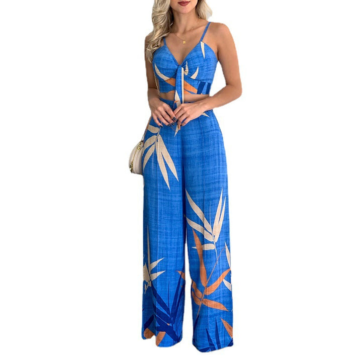 Kvinnors eleganta set med kombination av crop top och vida byxor Mirla-Eva Jonsson