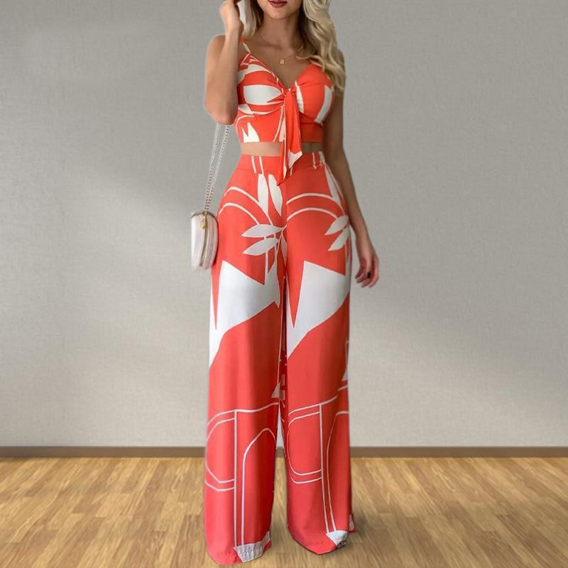 Kvinnors eleganta set med kombination av crop top och vida byxor Mirla-Eva Jonsson