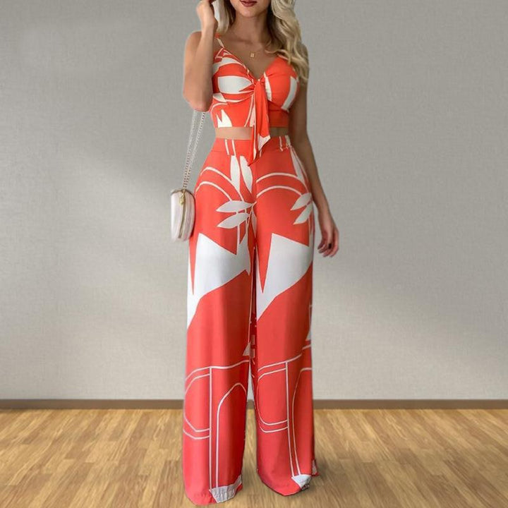 Kvinnors eleganta set med kombination av crop top och vida byxor Mirla-Eva Jonsson