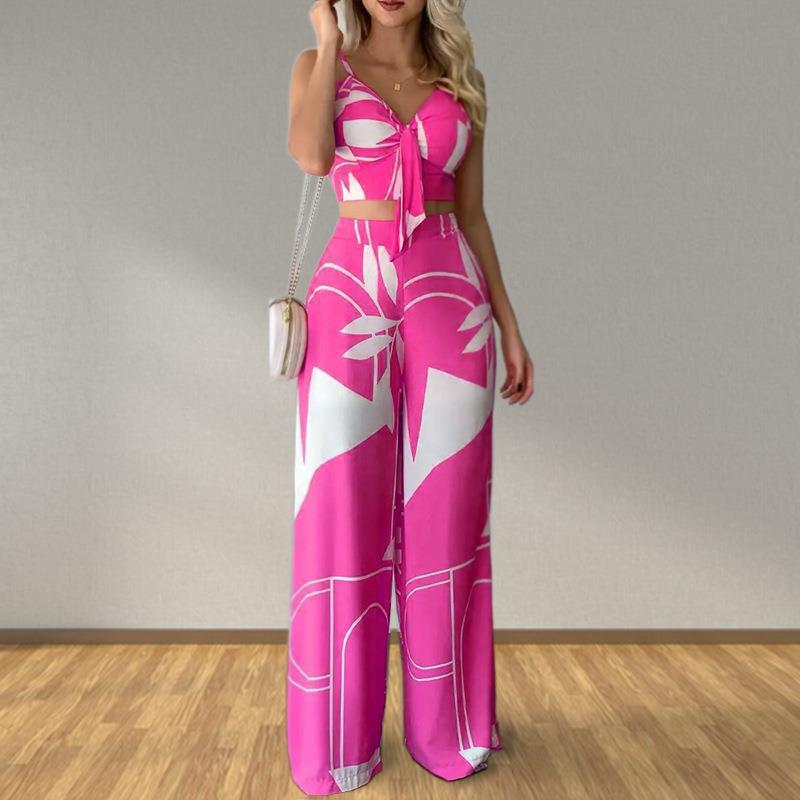 Kvinnors eleganta set med kombination av crop top och vida byxor Mirla-Eva Jonsson
