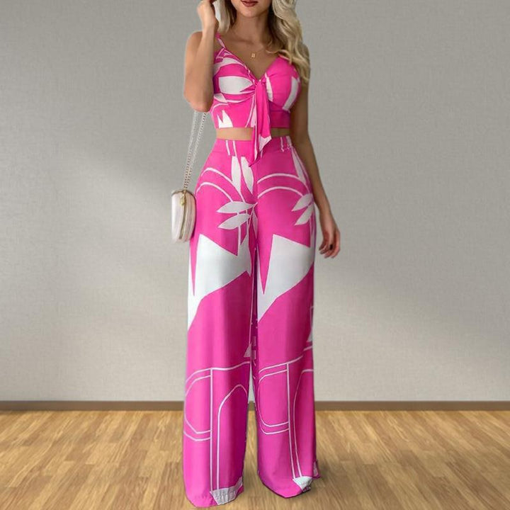 Kvinnors eleganta set med kombination av crop top och vida byxor Mirla-Eva Jonsson