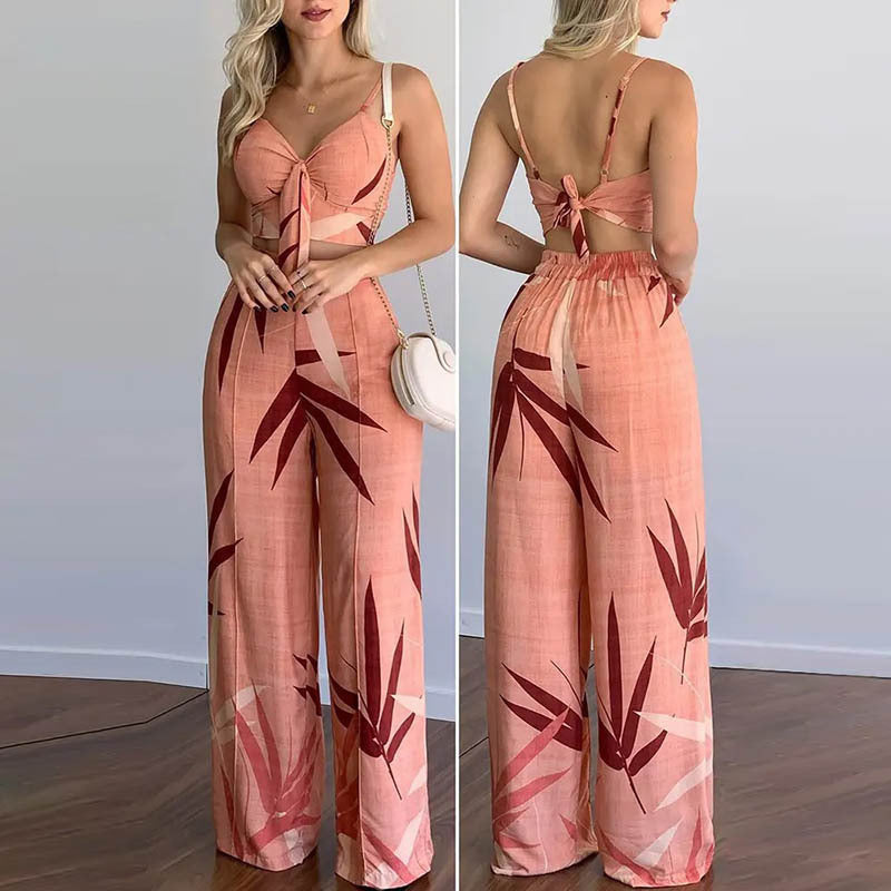 Kvinnors eleganta set med kombination av crop top och vida byxor Mirla-Eva Jonsson