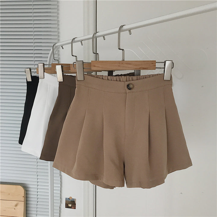 Kvinnors eleganta shorts med veck och knappdetalj-Eva Jonsson