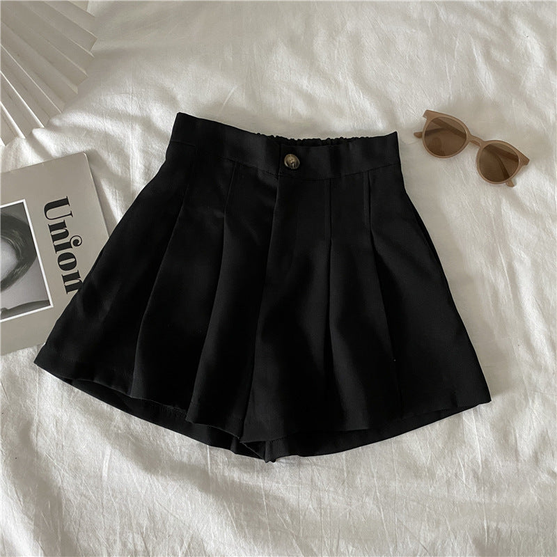 Kvinnors eleganta shorts med veck och knappdetalj-Eva Jonsson
