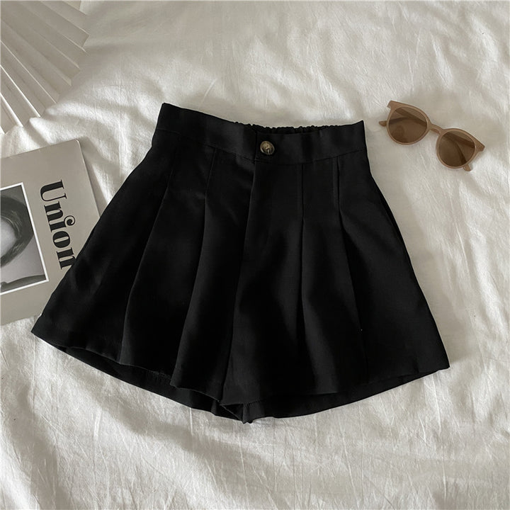 Kvinnors eleganta shorts med veck och knappdetalj-Eva Jonsson