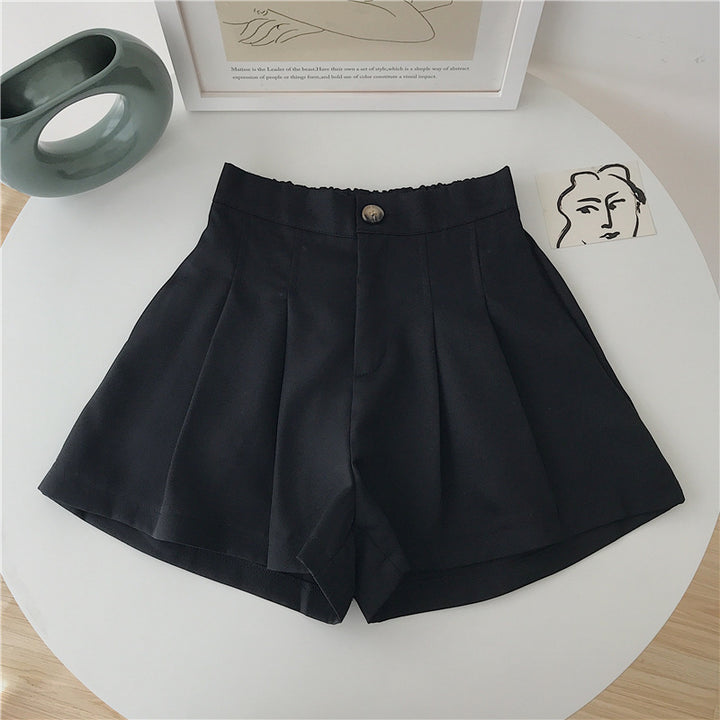 Kvinnors eleganta shorts med veck och knappdetalj-Eva Jonsson