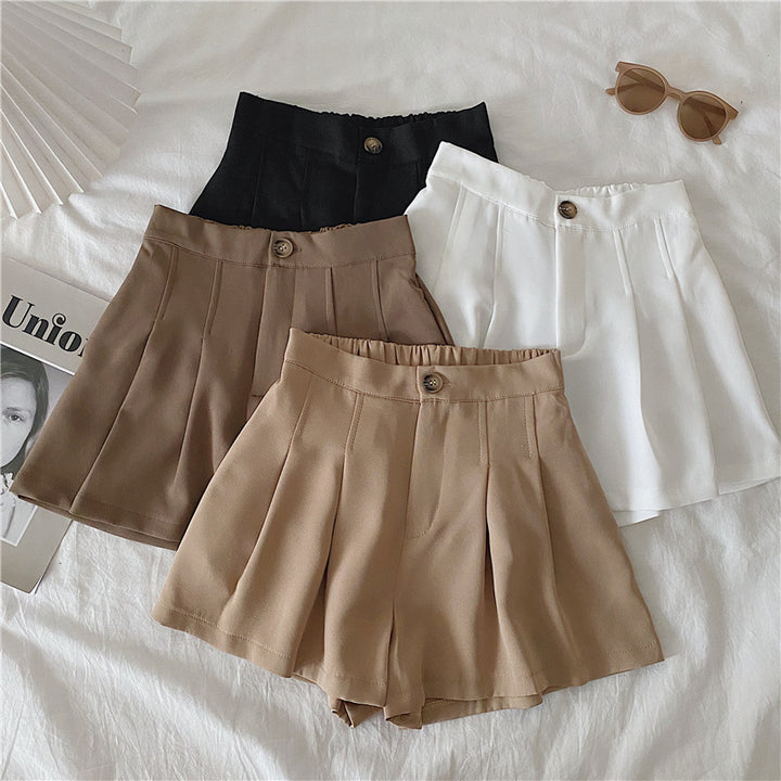 Kvinnors eleganta shorts med veck och knappdetalj-Eva Jonsson