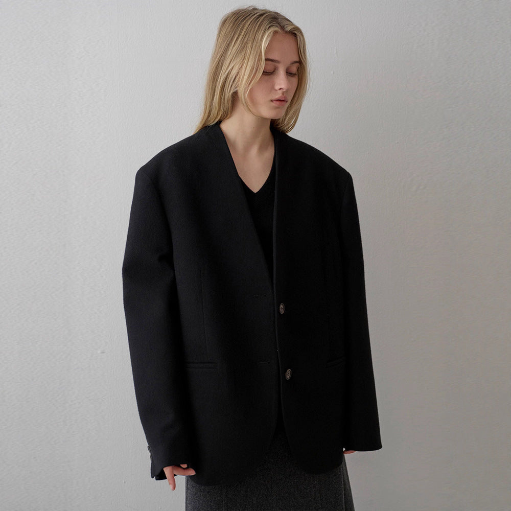 Kvinnors eleganta stickade blazer med asymmetrisk skärning Mirla-Eva Jonsson