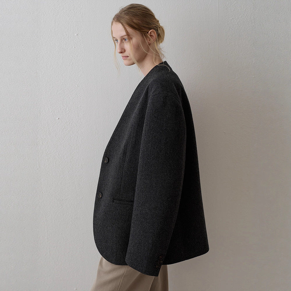 Kvinnors eleganta stickade blazer med asymmetrisk skärning Mirla-Eva Jonsson