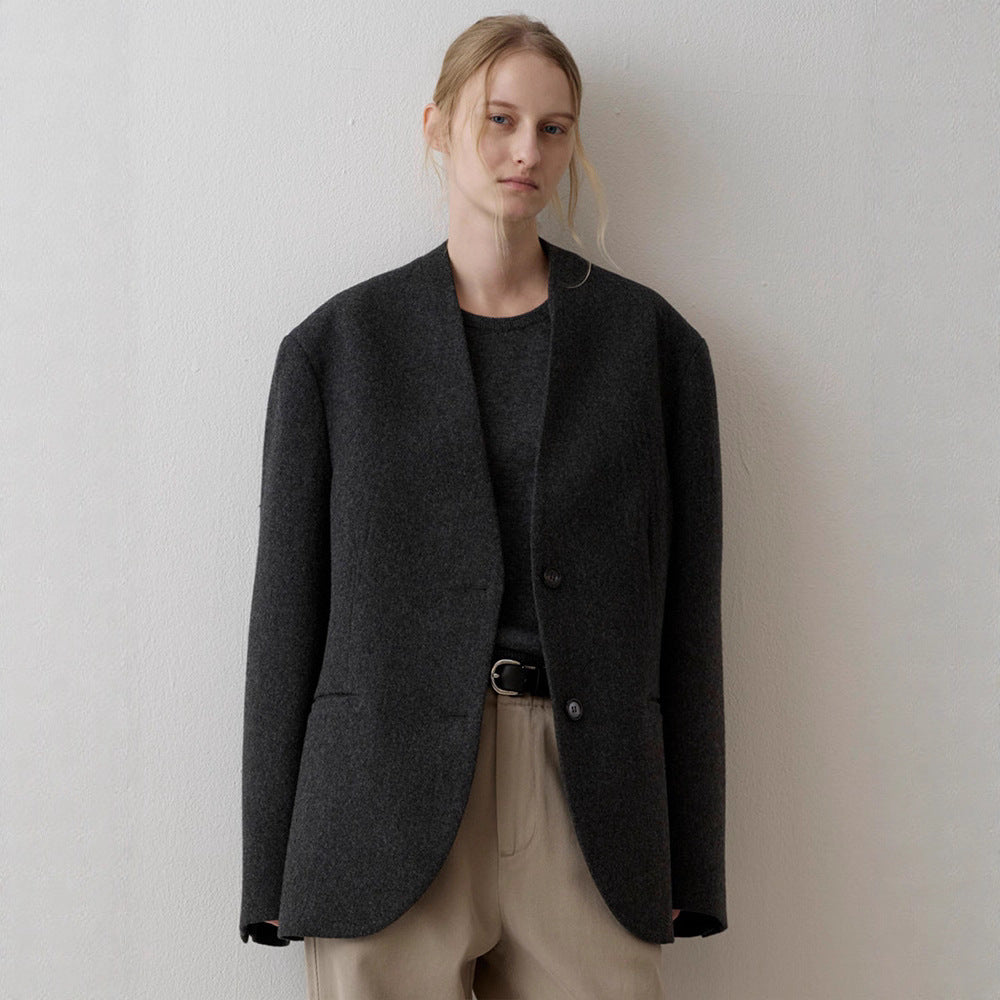 Kvinnors eleganta stickade blazer med asymmetrisk skärning Mirla-Eva Jonsson