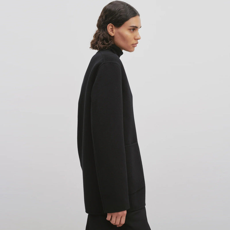 Kvinnors eleganta stickade blazer med stora slag och praktiska fickor Mirla-Eva Jonsson