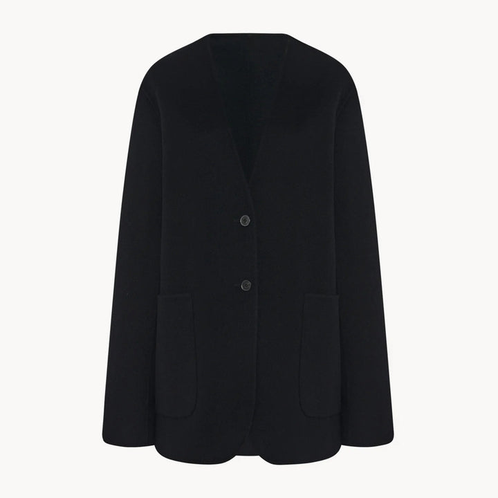 Kvinnors eleganta stickade blazer med stora slag och praktiska fickor Mirla-Eva Jonsson