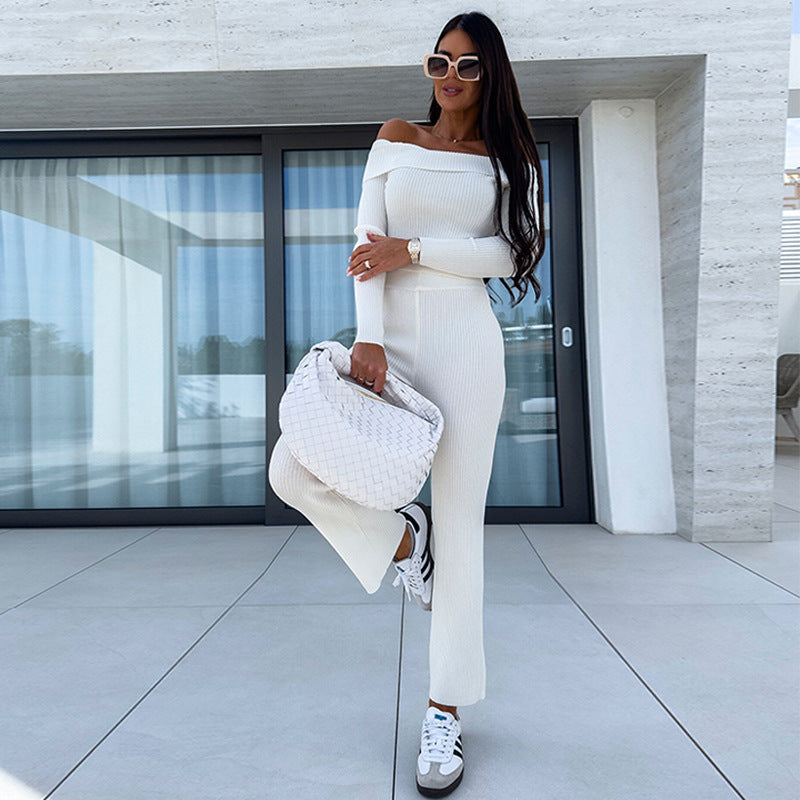 Kvinnors eleganta stickade jumpsuit med off-shoulder design och vida ben Mirla-Eva Jonsson