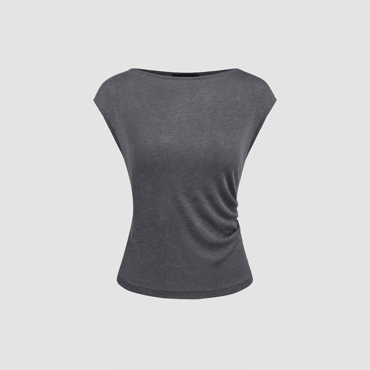 Kvinnors eleganta topp med asymmetriskt draperad design Mirla-Eva Jonsson