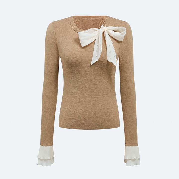 Kvinnors eleganta topp med chic rosettapplikation Mirla-Eva Jonsson
